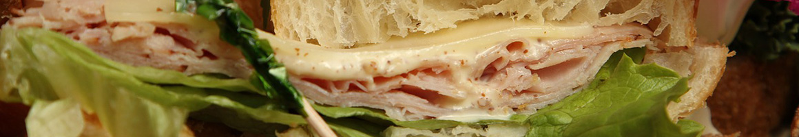 Eating Sandwich at Village Bagels of Fairfield restaurant in Fairfield, CT.